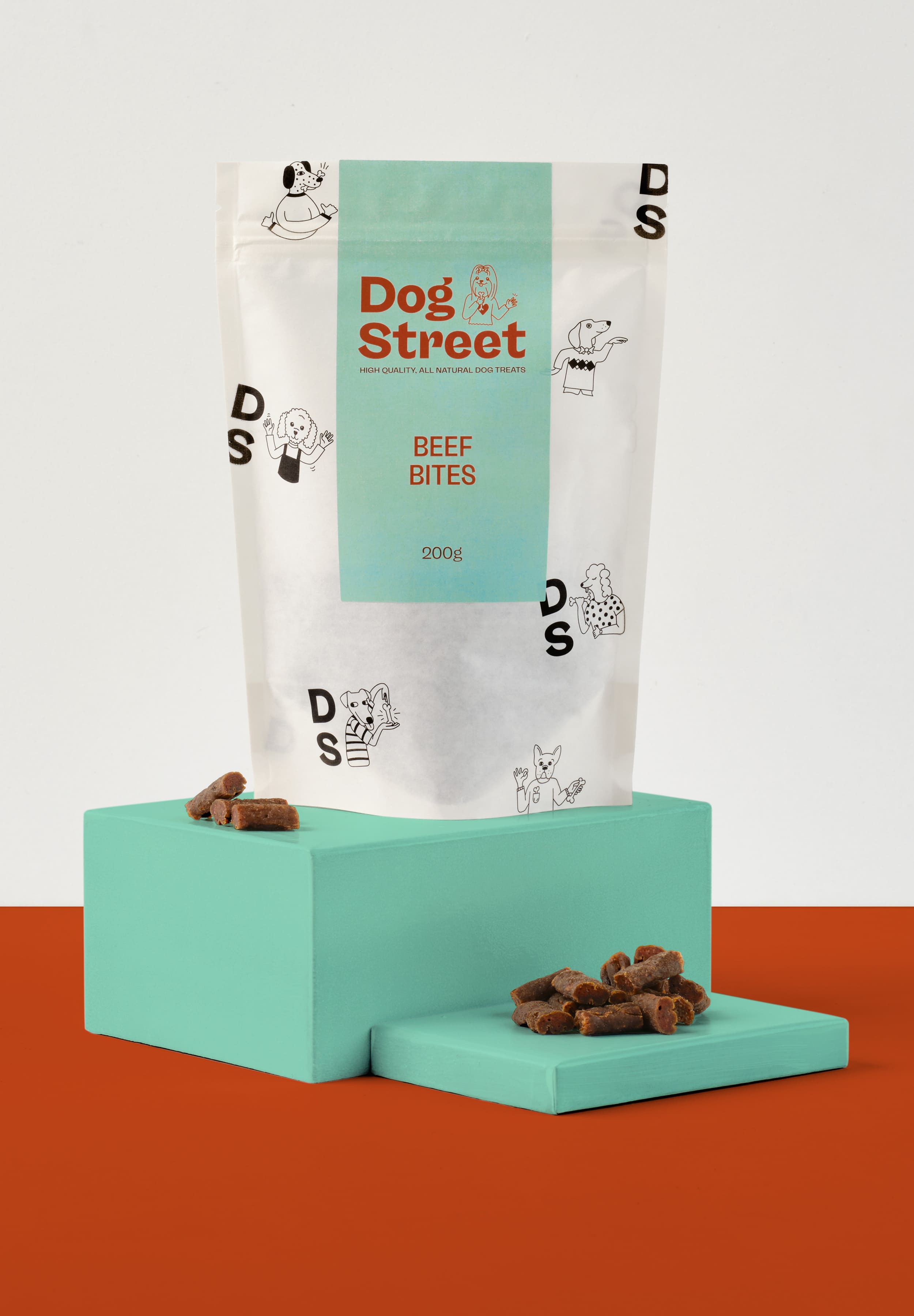 Styled shot of Dog Street Beef Bites pack and treats.